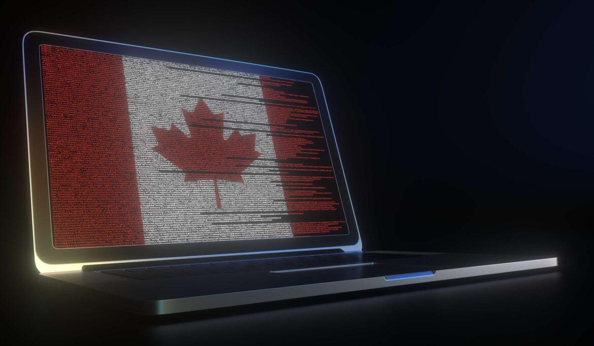 Flag,Of,Canada,Made,With,Computer,Code,On,The,Laptop